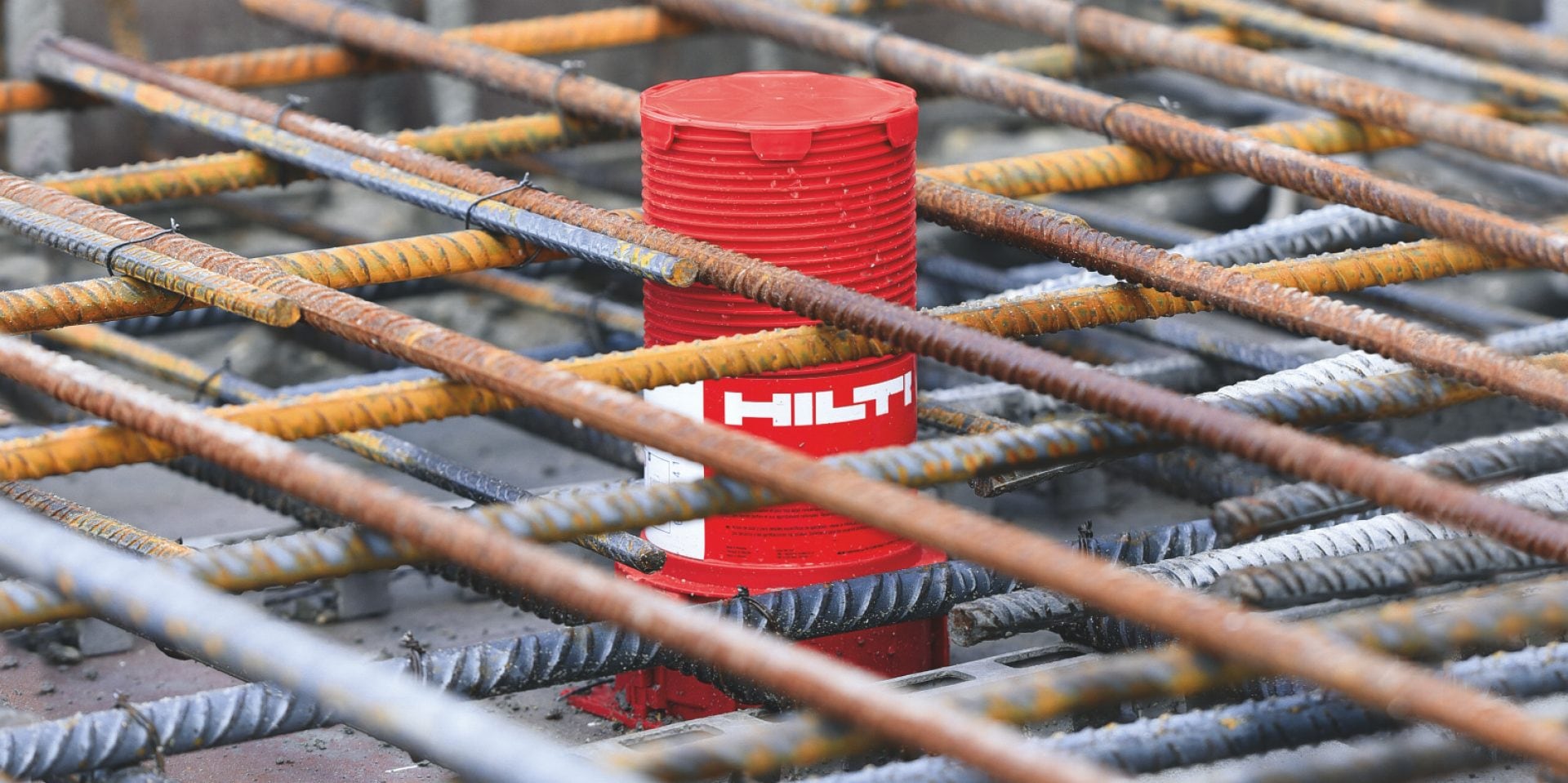 Hilti firestop cast-in sleeves for cables and pipes being placed on concrete slabs after laying them out in BIM